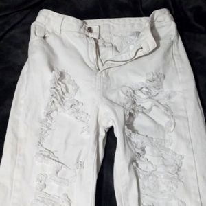 White ripped jeans